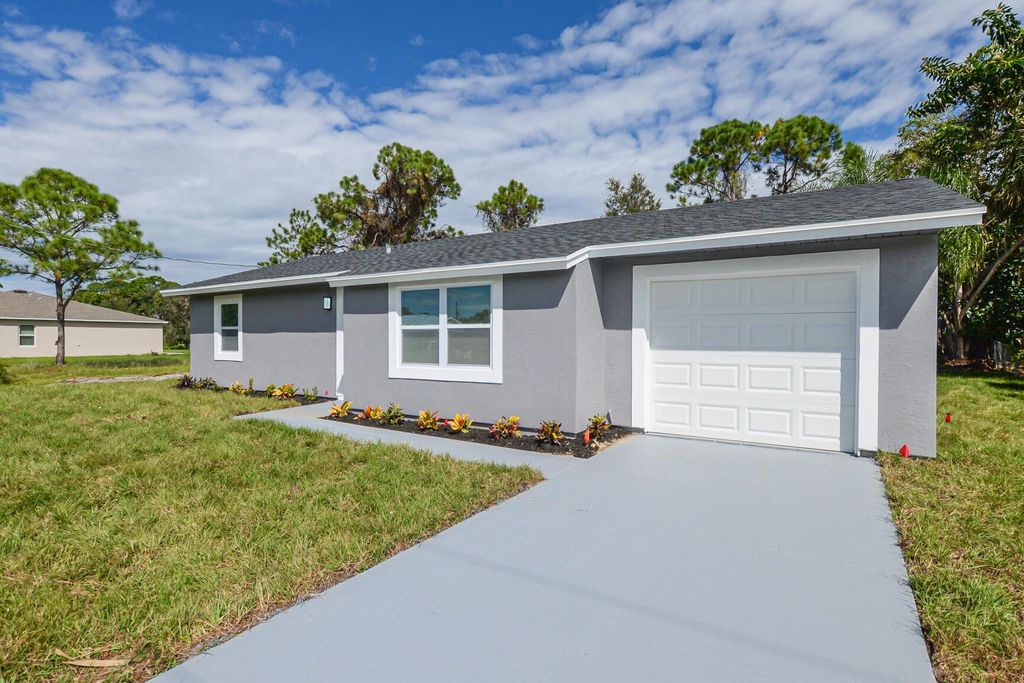 Photo of 957 SW Nichols Terrace, Port St Lucie, FL 34953 (MLS # R10903567)
