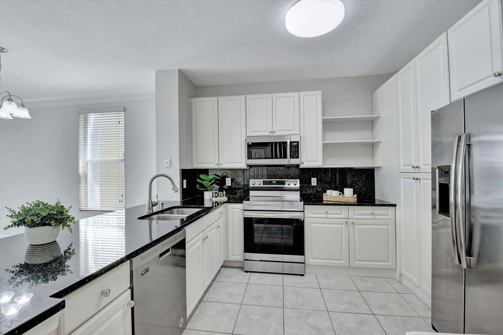 Photo of 9917 PORTA LEONA Lane, Boynton Beach, FL 33472 (MLS # B26055723)