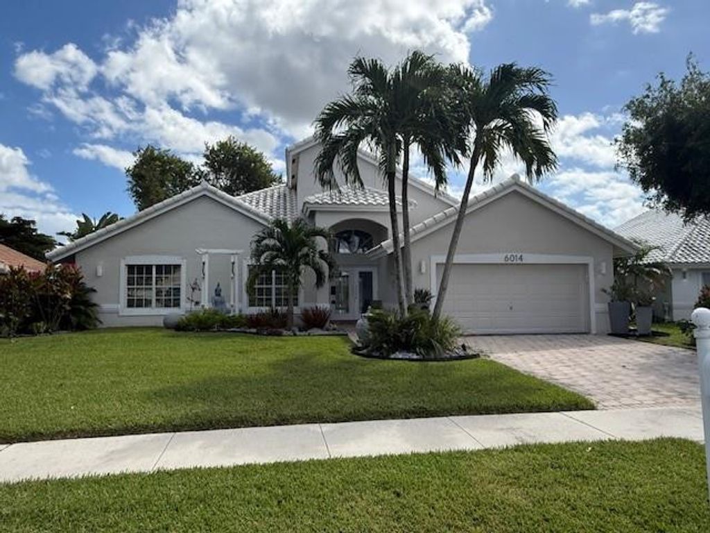 Photo of 6014 Golf Villas Drive, Boynton Beach, FL 33437 (MLS # F10531571)