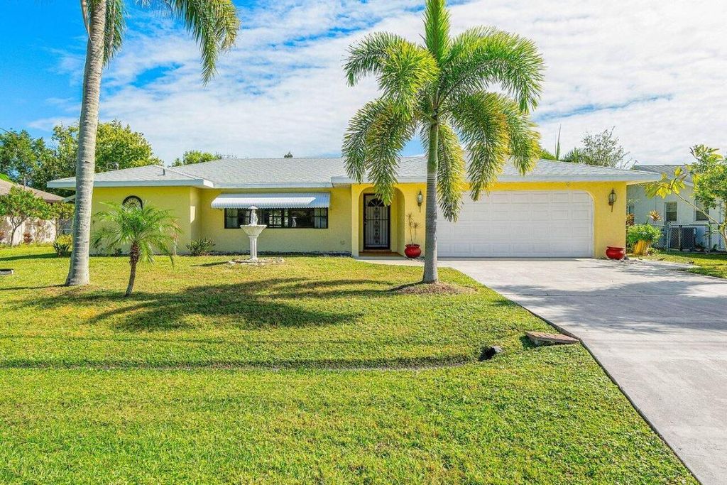 Photo of 2211 SE Sidonia Street, Port Saint Lucie, FL 34952 (MLS # R10936491)