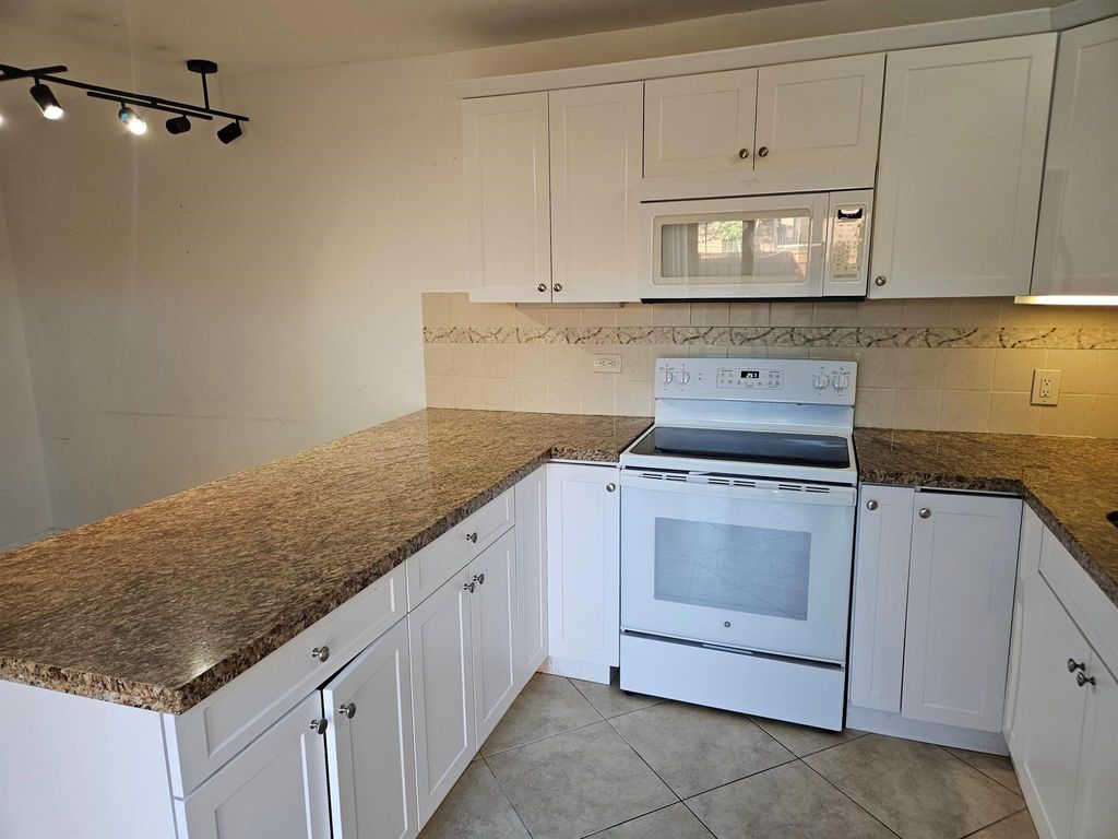 Photo of 3900 County Line Road #10a, Jupiter, FL 33469 (MLS # R10972968)