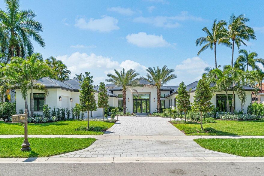 Presenting a prized offering of a COMPLETELY REBUILT custom estate home in the prestigious Vintage Oaks community located within The Polo Club. This stunning home exemplifies a calming and relaxing vibe combining natural elements and luxurious spa-like details throughout. The symmetric exterior with meticulous landscaping sets the tone as you enter this warm and inviting home. Upon entering, the combination of bright oversized porcelain flooring and a custom crystal-lit seated bar with earth tones is the perfect environment to welcome family and friends. Leading into the high-end kitchen with state-of-the-art appliances, the Tajmahal island is an ideal place to gather. Flowing over into the open oversized great room is a 10-person dining area and custom-built media wall that creates a -> focal point for entertainment viewing. Leading outdoors to the expansive wood-adorned loggia, a resort-like experience begins. The wide lake views serve as the backdrop while enjoying the heated zero edge pool with a sun shelf and submersed spa. The outdoor entertainment continues with an incorporated fire feature and putting green. The impressive exterior views are continued to be enjoyed from the sliding doors in the primary suite which offers two separate luxurious bathrooms and oversized custom-built closets with separate walk-ins. The four additional guest bedroom suites are all en-suite with custom-built walk-in closets. The layout of this perfectly appointed home is ideal with split bedrooms located on both wings of the home. An inspiring space is the home gym that amuses the eye while emanating focus. Exceeding your expectations is the state-of-the-art technology offered in this home that starts with a Tesla solar-powered roof. The garage offers a separate golf-cart space so that traveling to Polo Club's world-recognized clubhouse is an enjoyable ride.