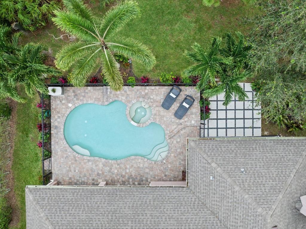 Photo of 5828 NW Windy Pines Lane, Port Saint Lucie, FL 34986 (MLS # R11051060)