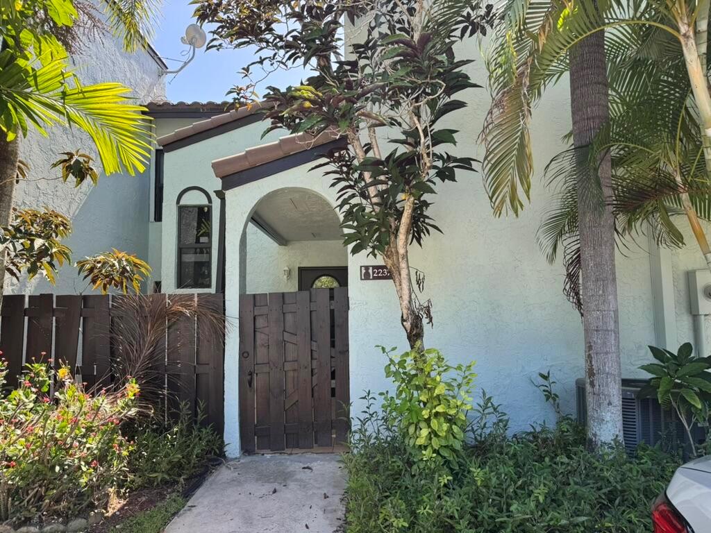 Great location! Spacious townhouse in the heart of Boca Raton, close to Town Center Mall. Features 3 bedrooms and 3 full bathrooms - one bedroom downstairs and two upstairs. Vinyl laminate flooring on stairs and upstairs bedrooms; ceramic tile on the first floor. Neutral colors throughout. Assigned parking space #73 located directly in front of the unit, with additional guest parking available. HOA approval takes approximately 3 to 4 weeks. Pet restrictions apply.Tenant-occupied - DO NOT DISTURB.Showings available only after July 11, 2025.