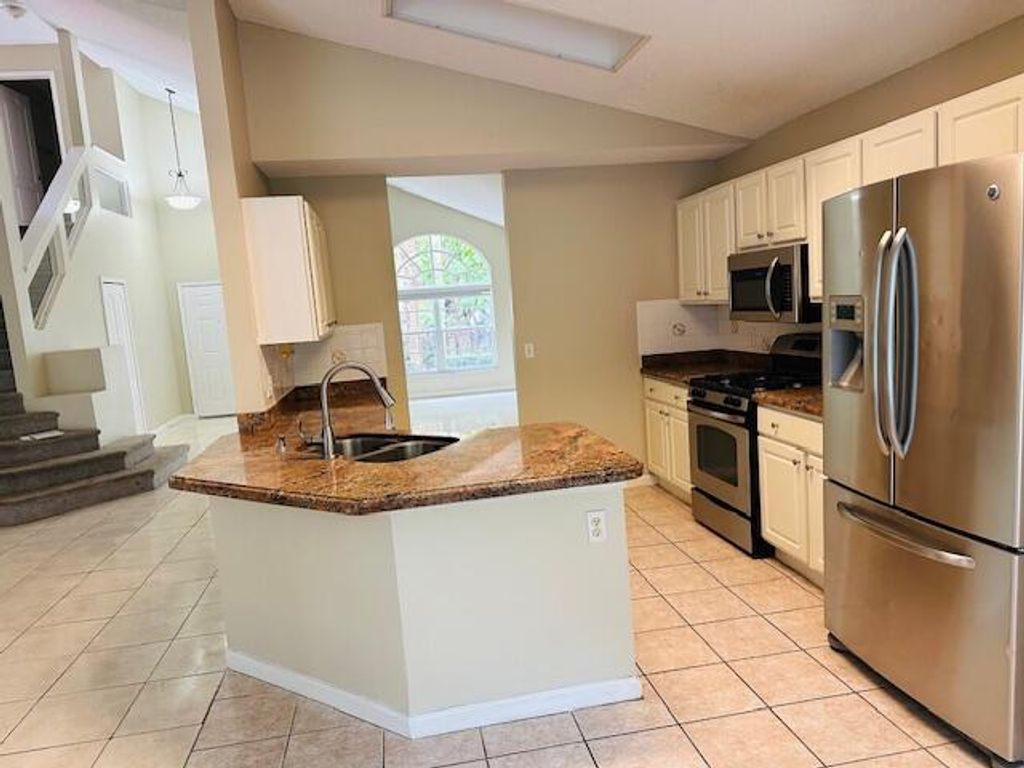 Photo of 459 Woodview Circle, Palm Beach Gardens, FL 33418 (MLS # R11028852)