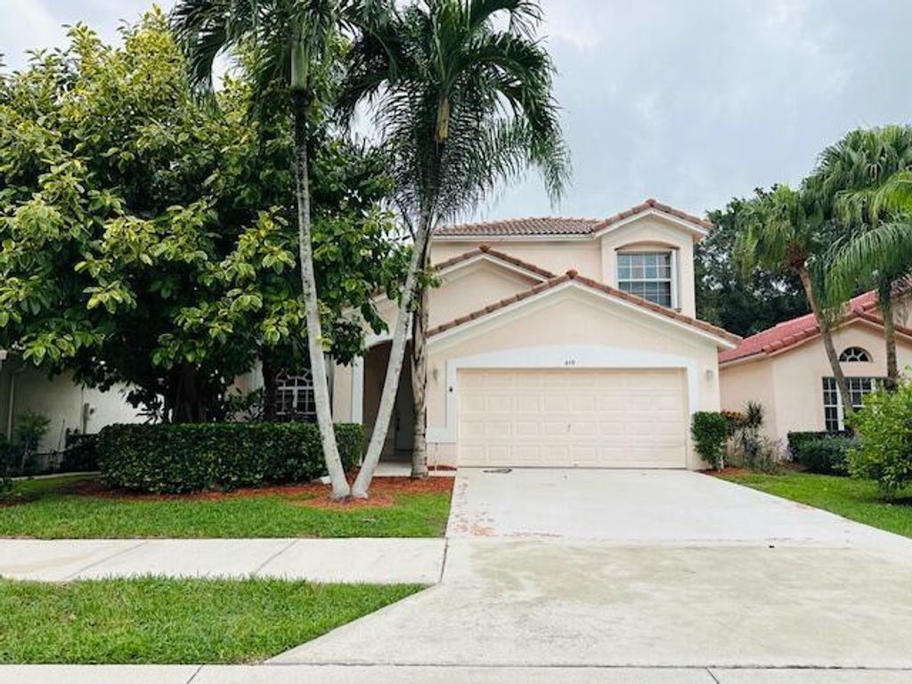 Photo of 459 Woodview Circle, Palm Beach Gardens, FL 33418 (MLS # R11028852)