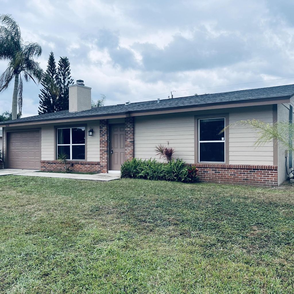 Photo of 530 SW Prima Vista Boulevard, Port Saint Lucie, FL 34983 (MLS # R11159768)