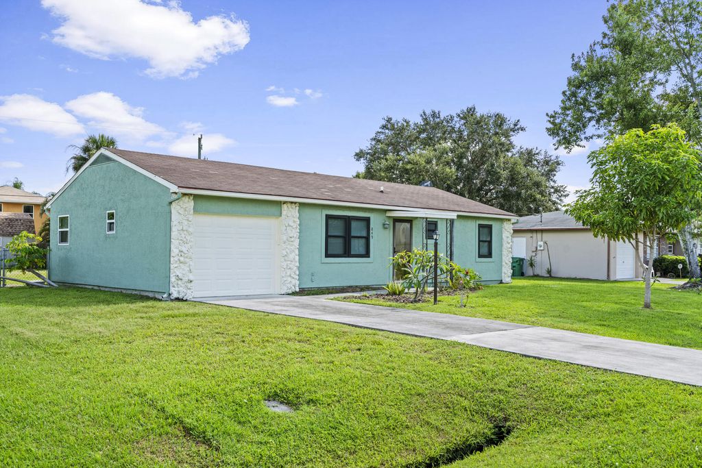 Photo of 849 SE Celtic Avenue, Port Saint Lucie, FL 34983 (MLS # R11140243)