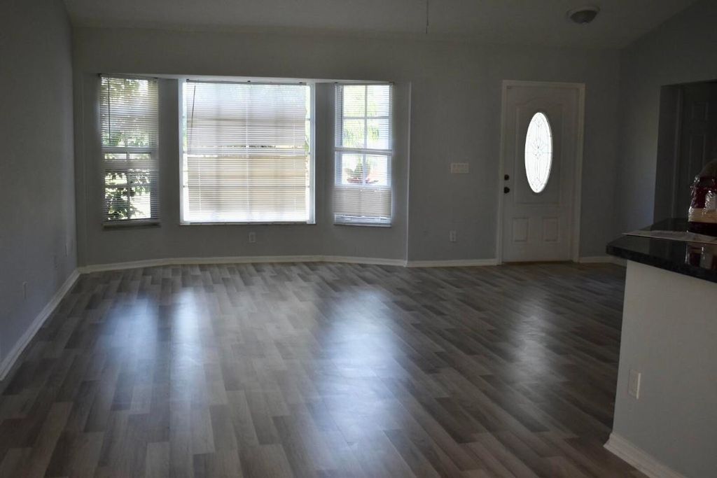 Photo of 1050 SE Euclid Lane, Port Saint Lucie, FL 34983 (MLS # R10943828)