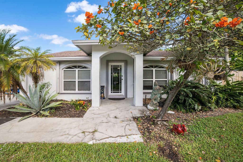 Photo of 15617 Temple Boulevard, The Acreage, FL 33470 (MLS # R10939716)