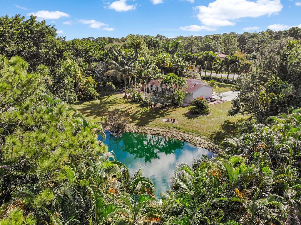Photo of 15617 Temple Boulevard, The Acreage, FL 33470 (MLS # R10939716)