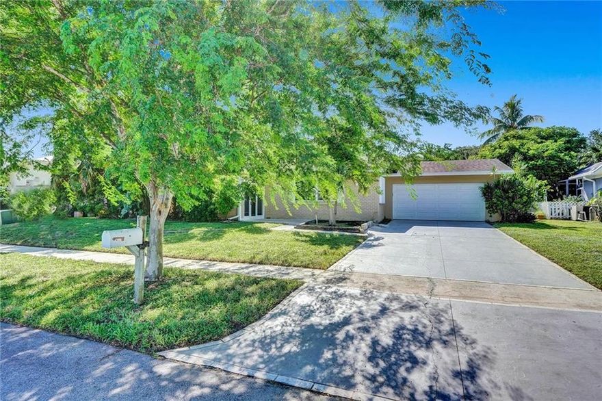 Everything you ever wanted in a home is here!  Finishing touches and love will make this house a showpiece.  Three large bedrooms, plus an extra large Florida room.  Bonus room could be den or office. Nice kitchen.  It's all here. Large families welcome.  Huge deck, tranquil and peaceful canal so gently landscaped.  Deck needs repair, please do not step on it for safety.  Two car garage, part segmented off.  Some shutters, unknown just how many or if complete.  Estate sale, priced to sell quickly.  Sold in as-is, where is, condition.  Hurry, will not last!