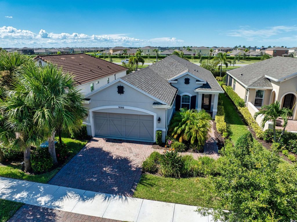 Photo of 9592 SW Royal Poinciana Drive, Port Saint Lucie, FL 34987 (MLS # R11067073)