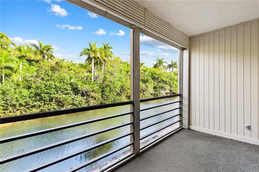 Best location in complex on the water with a green/peaceful view of Easterlin Park. Enjoy early morning sunrises from your private screened patio. Updated bathrooms and kitchen includes granite  tops and backsplash. Brand new luxury wood-like vinyl flooring. Each bedroom has its own full bathroom. Close parking space! 3 pools ,his/her gyms, community room, water and  trash included in maint. fee. This guard gated community is centrally located in Broward County-just a few minutes drive to the beaches,Las Olas, Wilton Manors,  I95 and turnpike access. Community waterfront park just outside the complex!