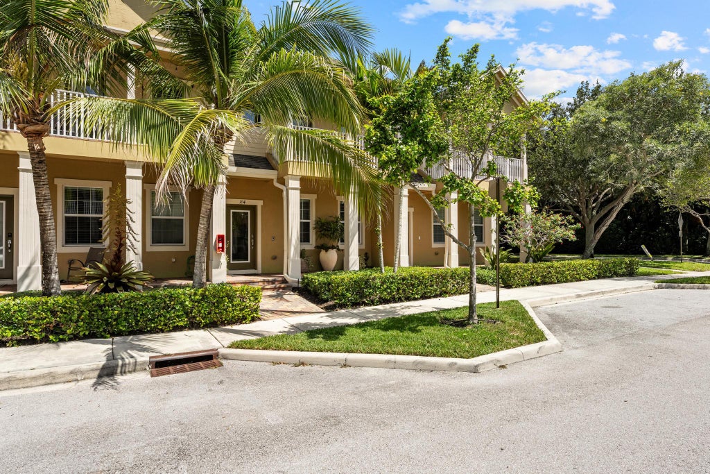 Photo of 119 BLACK IRONWOOD Road #104, Jupiter, FL 33458 (MLS # B26074691)