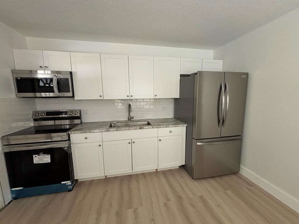 Photo of 2626 S 29th Street #Apt B, Fort Pierce, FL 34981 (MLS # R11112678)