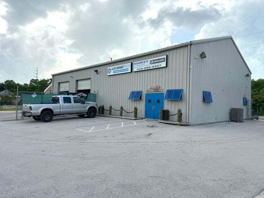 Rare opportunity to acquire a fully operational auto & marine repair facility in the heart of Key Largo. Situated on a high-visibility Overseas Hwy corridor, this ~4,000 SF warehouse sits on nearly 1 acre with ample parking, yard space, and frontage. Property includes lifts, tools, inventory, office buildout, and all licenses for immediate operation. Strong existing setup for automotive and marine services with indoor bays, storage, and secure lot. Ideal for owner-user or investor seeking a turnkey, income-producing asset with redevelopment upside.