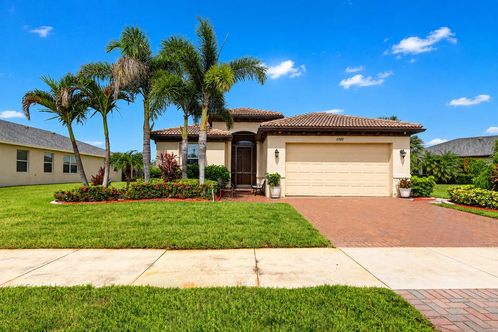 Photo of 11320 SW Lake Park Drive, Port Saint Lucie, FL 34987 (MLS # B26071456)