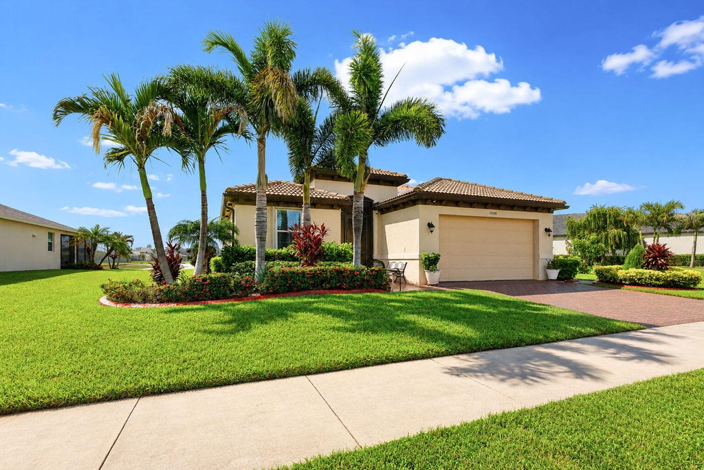 Photo of 11320 SW Lake Park Drive, Port Saint Lucie, FL 34987 (MLS # B26071456)