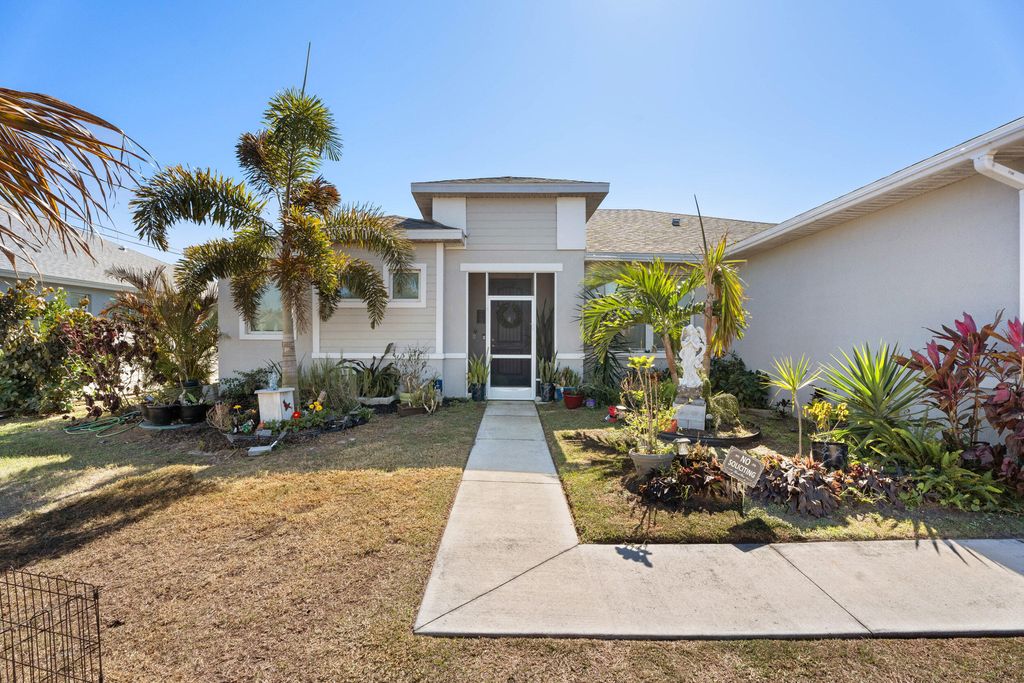 Photo of 1568 SW Abacus Avenue, Port Saint Lucie, FL 34953 (MLS # R11159733)