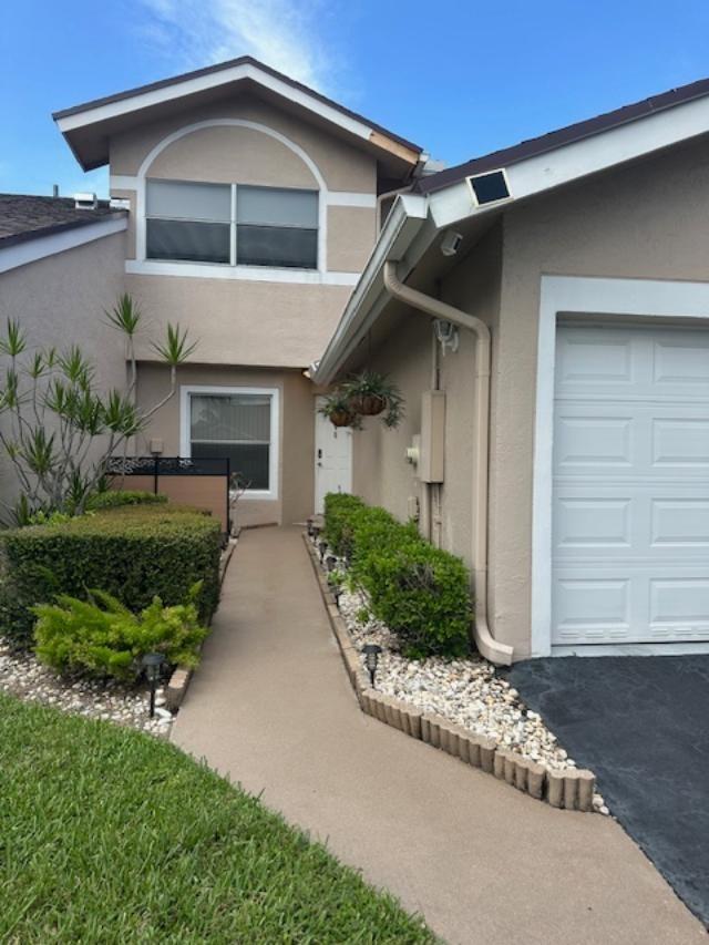 Photo of 1244 W Lakes Drive #1244, Deerfield Beach, FL 33442 (MLS # F10519647)