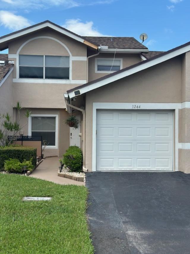 Photo of 1244 W Lakes Drive #1244, Deerfield Beach, FL 33442 (MLS # F10519647)