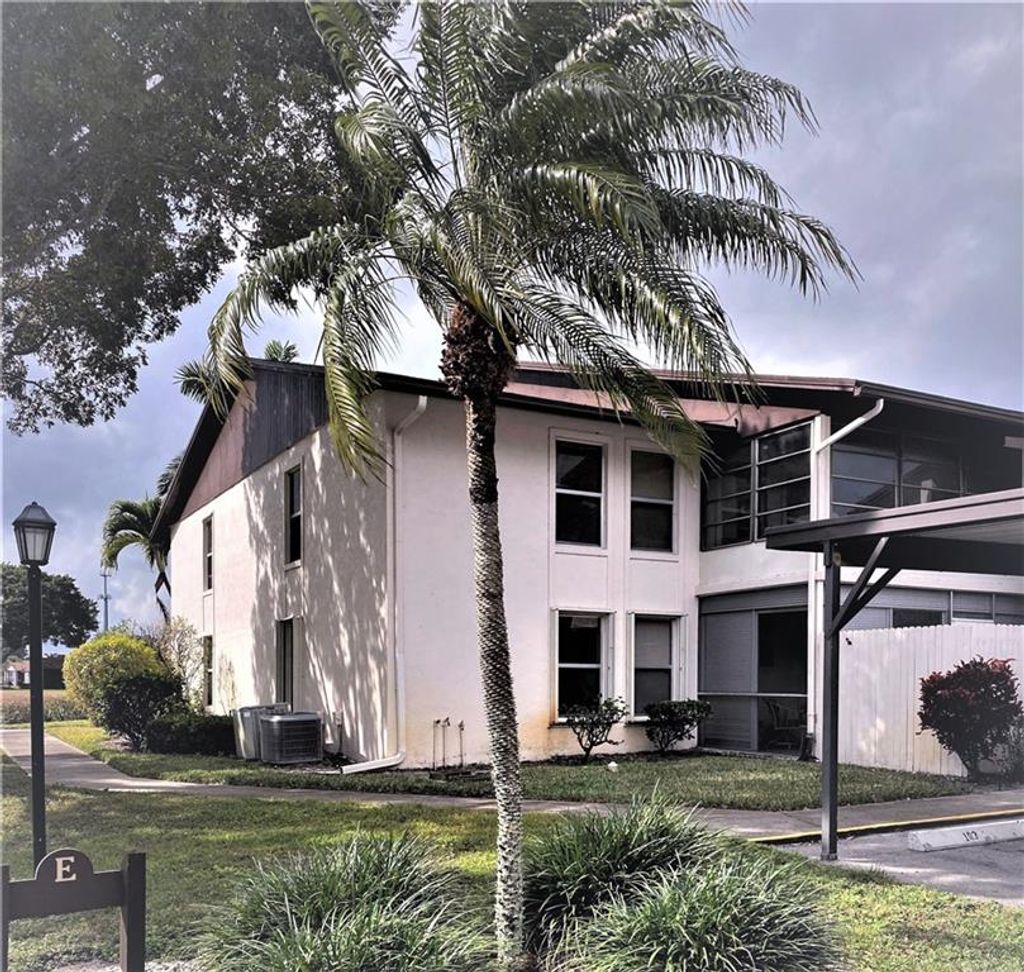 Photo of 6531 SE Federal Hwy Hwy #E 101, Stuart, FL 34997 (MLS # F10269999)