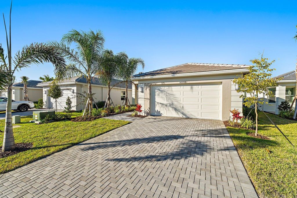 Photo of 14225 SW Waterfall Lane, Port Saint Lucie, FL 34987 (MLS # R11160931)