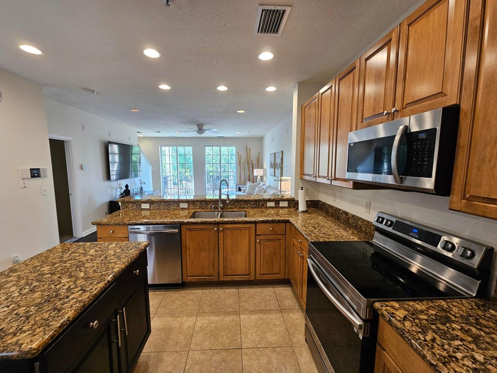Photo of 405 Schoolhouse Road, Jupiter, FL 33458 (MLS # B26026757)