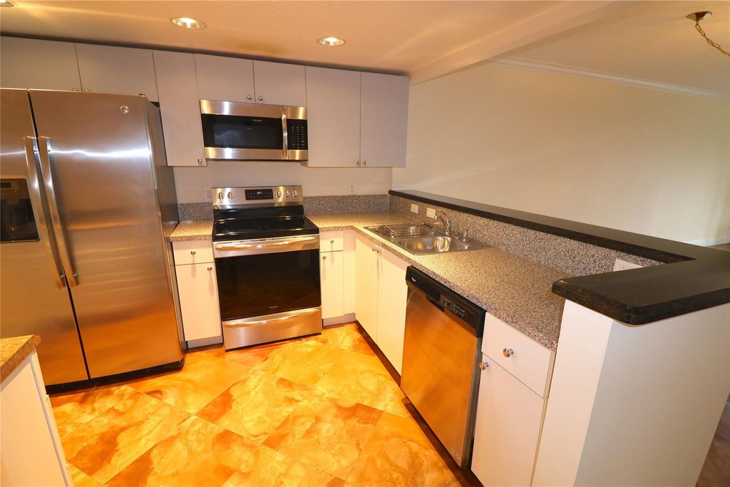 Photo of 3510 Oaks Way #401, Pompano Beach, FL 33069 (MLS # F10532334)
