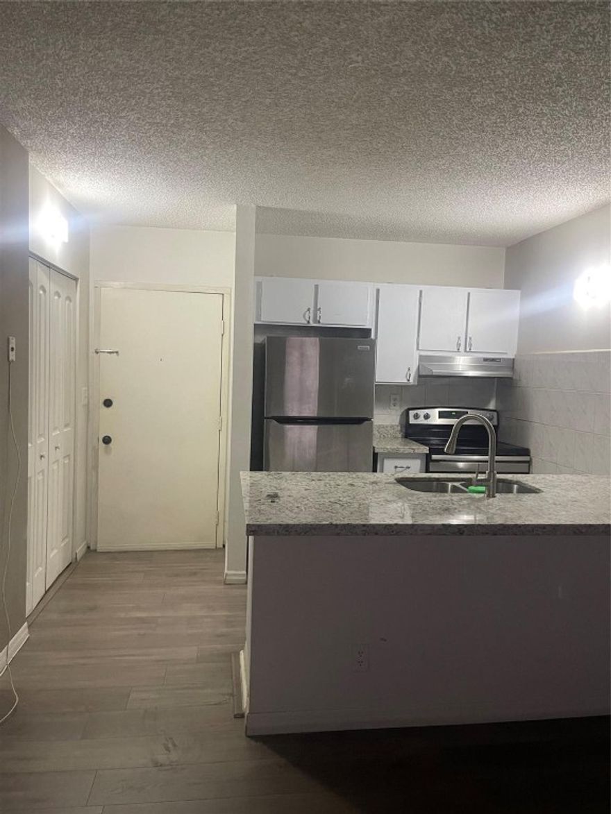 This property has a beautiful kitchen with granite counters and new appliances, vinyl flooring Throughout The Entire apartment, Tons of Closet Space Including Large Walk-In Closet in Bedroom. Rent Includes Water & Trash, One Assigned Parking Space, Secure Building Entry, Community Amenities Include Swimming Pool & Hot Tub, Close To Everything In Coral Springs & Close To Major Highways. Quick Association Approval, Hurry This Unit Will Go Fast!
