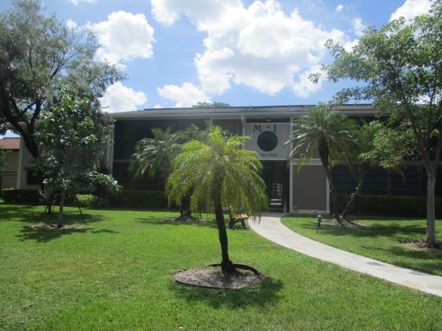 Spacious 2-Bedroom, 2-Bath 1st floor unit with serene a garden view! This generously sized condo offers a bright and open living/dining area, oversized bedrooms, and a screened balcony perfect for enjoying the peaceful surroundings. The unit is in overall fair condition and offers great potential with your personal touch. Conveniently located near schools, shopping, Coral Springs, and the Tamarac Sports Complex. Buyer's HOA requirements include a minimum 650 credit score and income minimum of $25k a year. Property is being sold AS IS. Buyer is solely responsible for verifying any assessments, HOA fees.