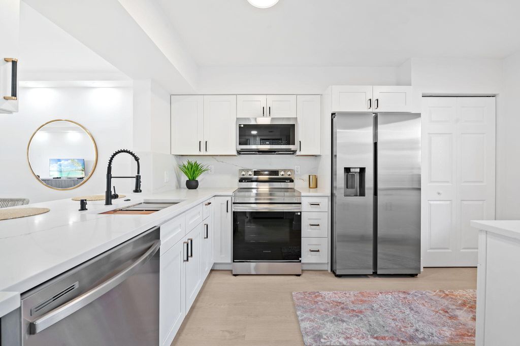 Photo of 7280 Amberly Lane #103, Delray Beach, FL 33446 (MLS # R11169717)