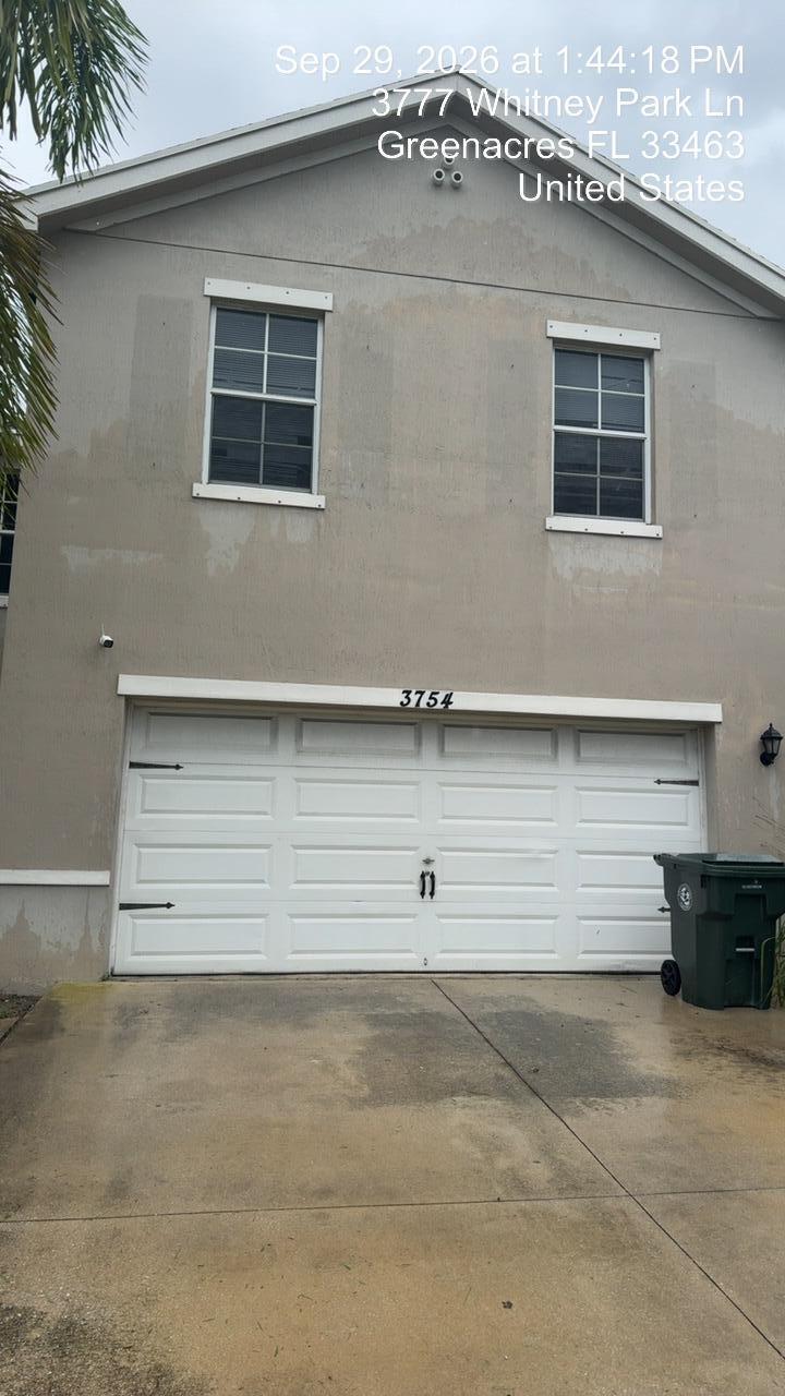 Photo of 3754 WHITNEY PARK Lane, Greenacres, FL 33463 (MLS # B26087403)