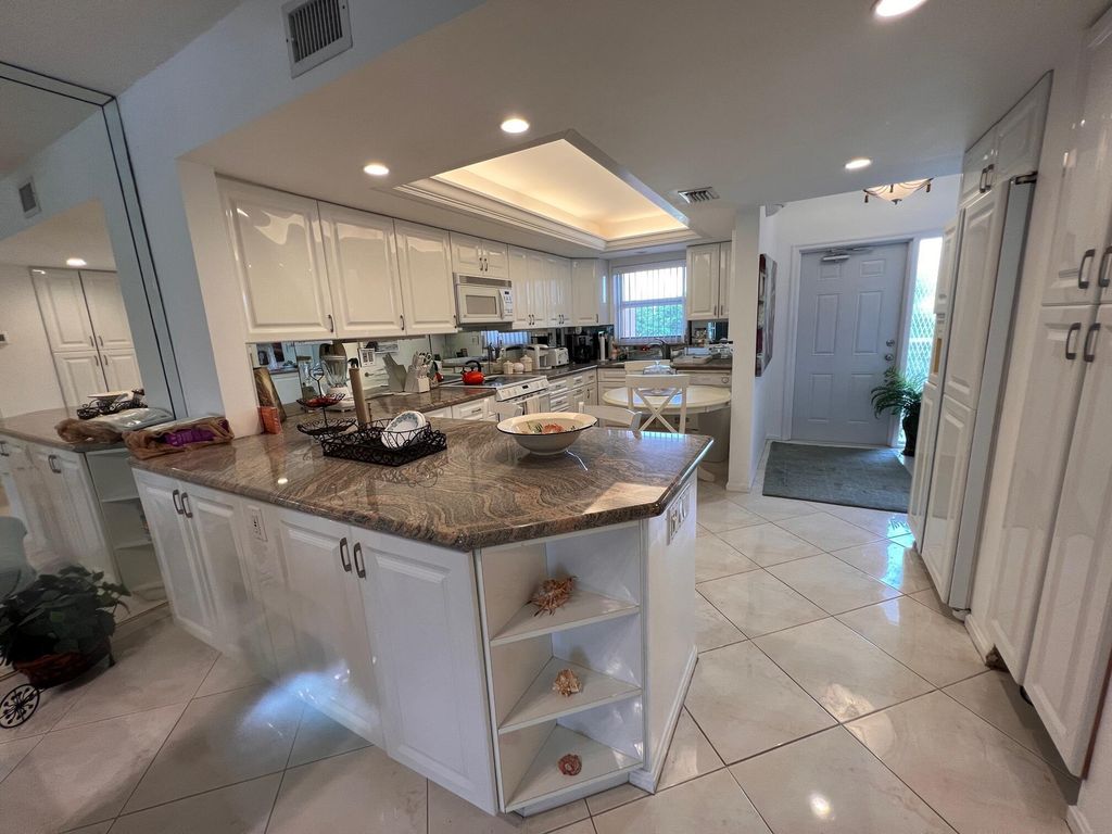 Photo of 1001 E Camino Real Real #202, Boca Raton, FL 33432 (MLS # R11025619)