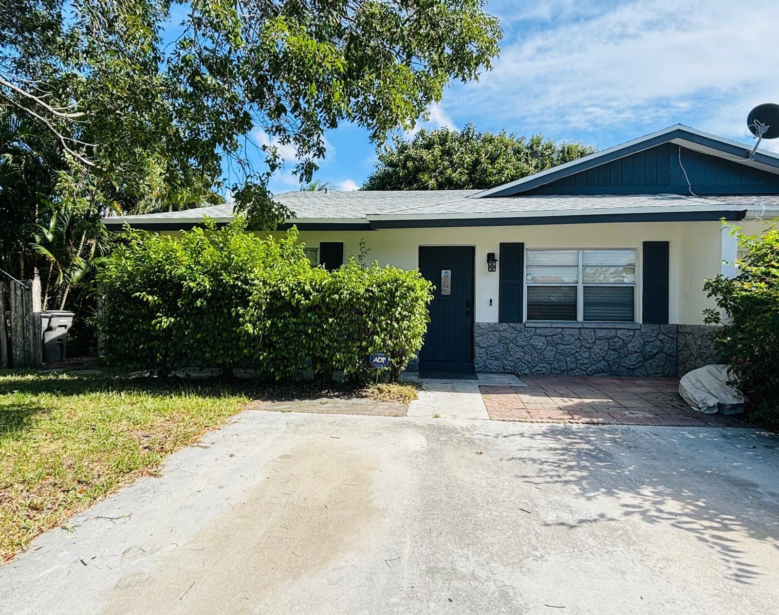 Charming updated 3-bedroom, 2-bath home with NO HOA ideally located in West Palm Beach/Palm Beach Gardens area. This completely renovated home features a new roof, new bathrooms, new flooring, and fresh paint inside and out, offering a move-in-ready living space. (New roof is being put on and exterior will be painted)Enjoy the spacious driveway, a full laundry room and a spacious backyard. Conveniently located just minutes from The Gardens Mall, top restaurants, beaches, and major highways.