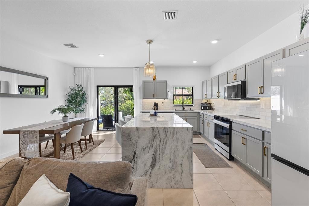 Photo of 884 NW 3rd Terrace #884, Pompano Beach, FL 33060 (MLS # F10544391)