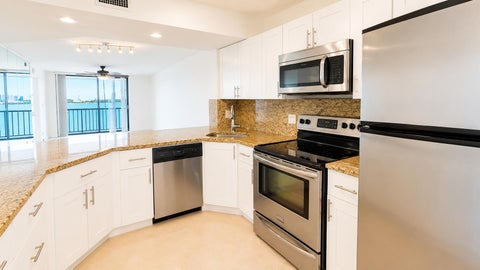 Photo of 115 Lake Emerald Drive #210, Oakland Park, FL 33309 (MLS # B26061842)