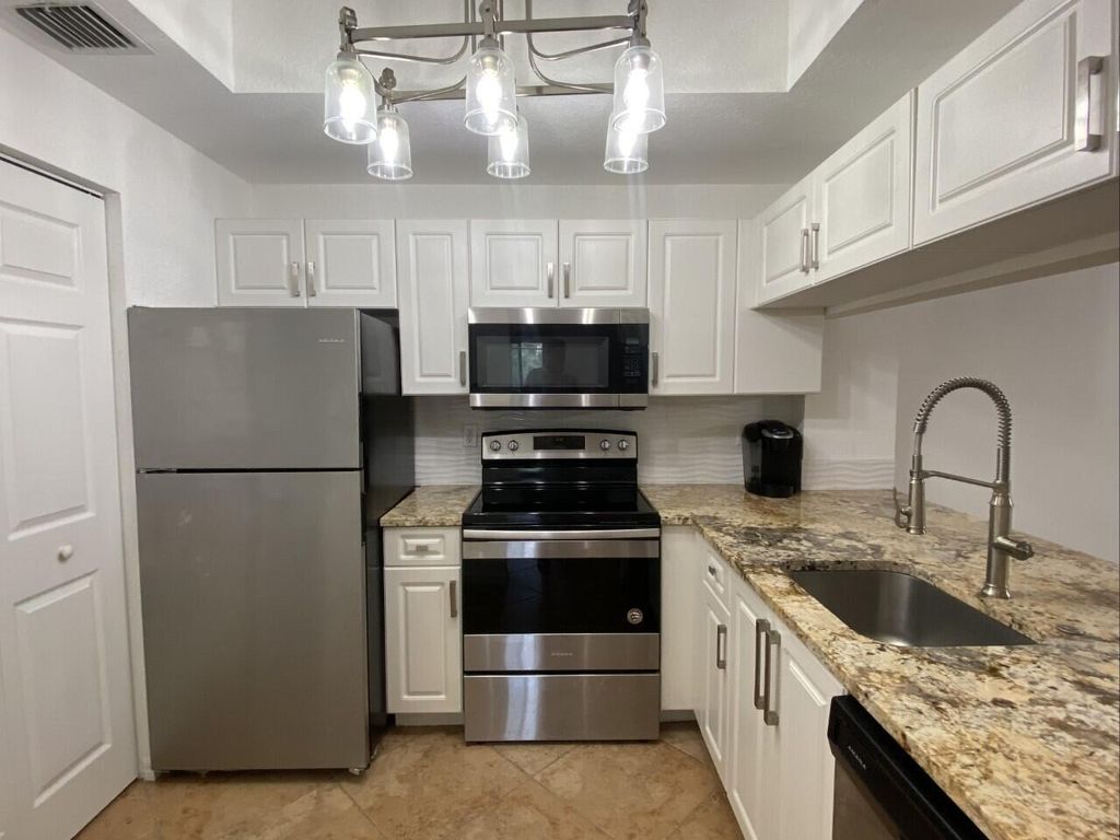 Photo of 2812 Grande Pkwy #202, Palm Beach Gardens, FL 33410 (MLS # R11119638)