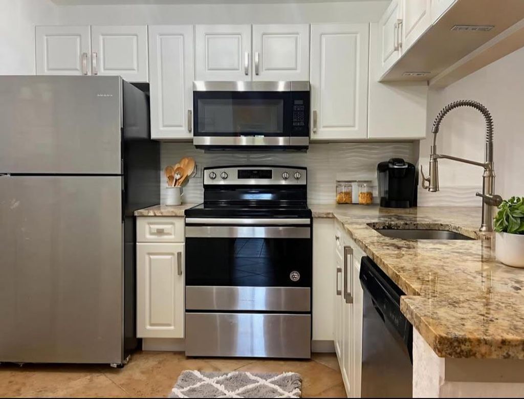 Photo of 2812 Grande Pkwy #202, Palm Beach Gardens, FL 33410 (MLS # R11119638)