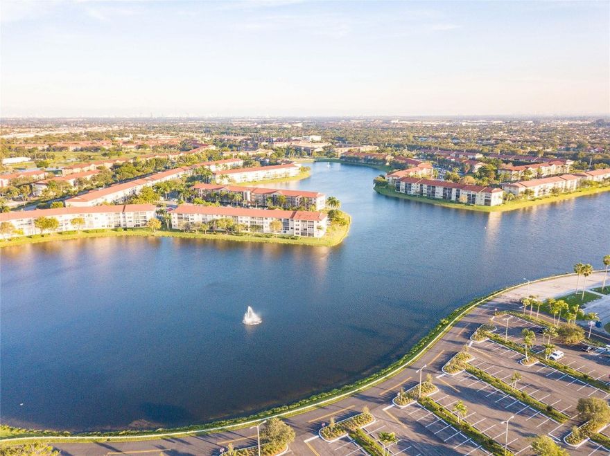 "HIBISCUS MODEL" IN BUCKINGHAM BUILDING- A  !!! 2ND FLOOR &  PLENTY OF GUESS PARKING SPACES.!!! WASHER AND DRYER INSIDE UNIT.  FANTASTIC LOCATION .  THOUGHT ORIGINAL,THIS SPACIOUS UNIT IS FULL OF POTENTIAL-READY FOR YOUR PERSONAL TOUCH AND UPGRADES.  ENJOY RESORT-STYLE LIVING  WITH HEATED POOL, TENNIS FITNESS CENTER, AND MORE. NEAR HOSPITALS, SHOPPING.  A TRUE GEM WITH GREAT BONES !!!