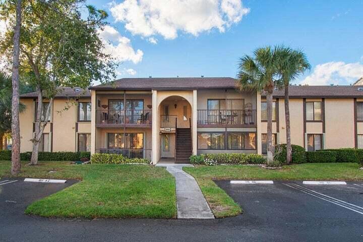 Photo of 815 Sky Pine Way #A1, Greenacres, FL 33415 (MLS # B26071703)