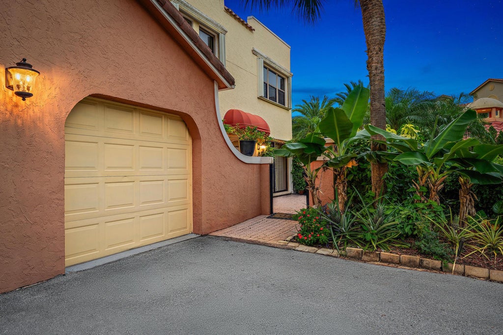 Photo of 54 Uno Lago Drive, Juno Beach, FL 33408 (MLS # R10998361)