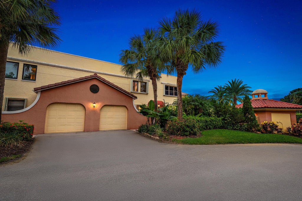Photo of 54 Uno Lago Drive, Juno Beach, FL 33408 (MLS # R10998361)