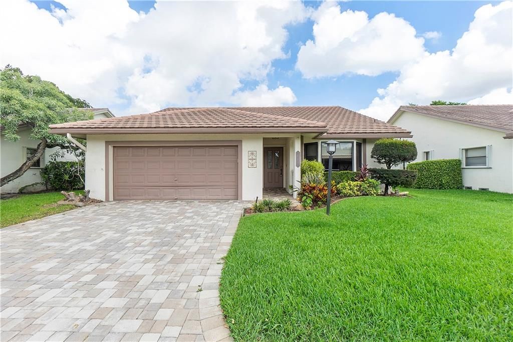 Photo of 1485 Lakeview Cir, Coral Springs, FL 33071 (MLS # F10337337)