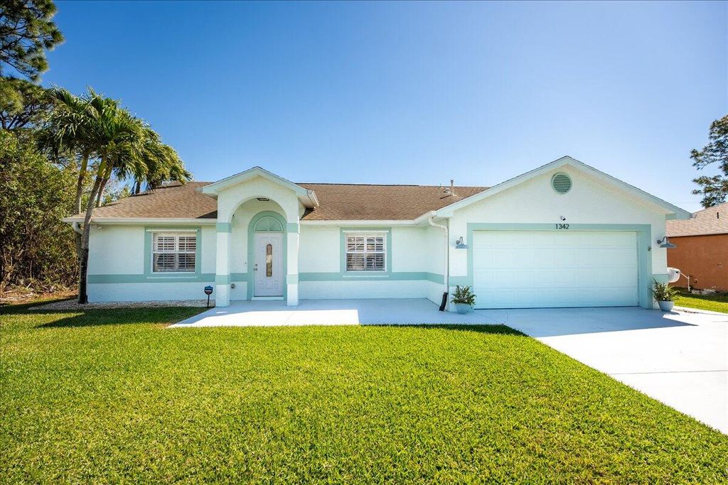 Photo of 1342 SW Halford Avenue, Port Saint Lucie, FL 34953 (MLS # R10961757)