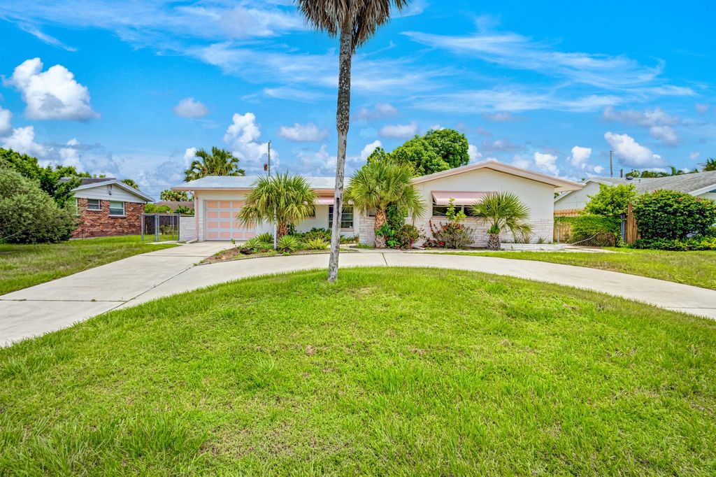 Photo of 9832 Daisy Avenue, Palm Beach Gardens, FL 33410 (MLS # R10909575)