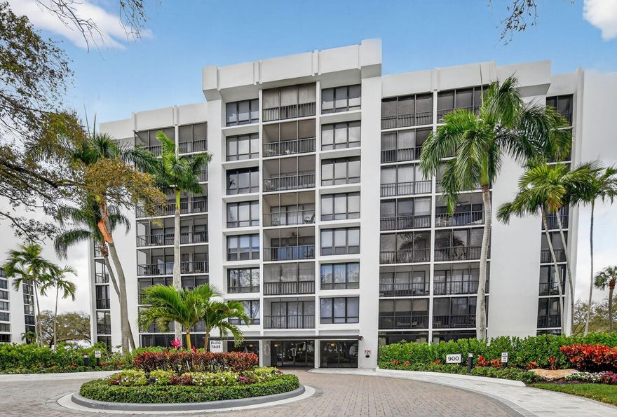 Beautifully renovated end unit on 5th floor with golf course views.  All neutral decor, solid wood doors, SS appliances, washer/dryer in unit, electric shades, impact glass doors, golf cart parking available.  Enjoy the world class amenities of Boca West, tennis, pickleball, spa, fitness center, resort style pool, 7 dining venues, 4 championship golf courses