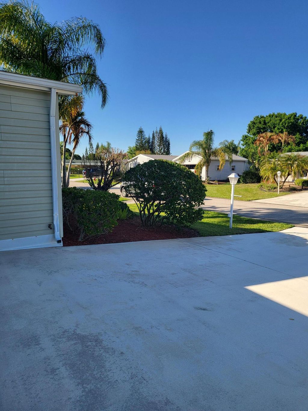 Photo of 8125 9th Hole Drive, Port Saint Lucie, FL 34952 (MLS # B26008833)