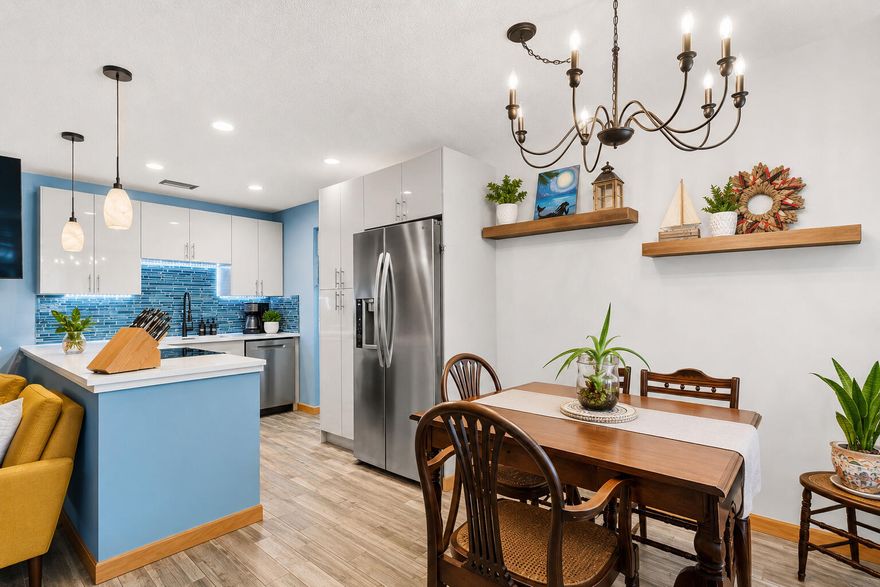 Beautifully remodeled 1BR/1.5BA condo in the desirable 55+ community of Vista Royale. This unit features a completely updated kitchen, luxury flooring throughout, and an open-concept kitchen/living/dining layout perfect for easy living. Enjoy custom closets, a stylish barn door detail in the bath area, shiplap accents that add warmth and character, and thoughtful finishes from top to bottom. Community amenities include pool and tennis courts. Conveniently located just minutes from shopping, dining, and approximately 10 minutes to the beach. This one will not last. All measurements approximate.